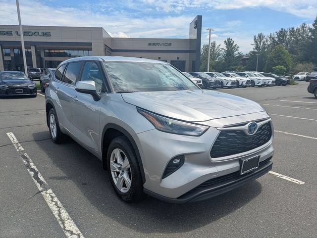 2023 Toyota Highlander LE in Celestial Silver Metallic — front three-quarter view